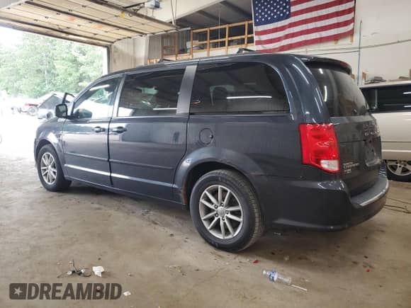 2014 Dodge Grand Caravan R/T with VIN 2C4RDGEG9ER431315, listed as a Copart auction lot 69931065 with 153,571 mi miles and Salvage title. Bid and sale history available at DreamBid. Image 2.