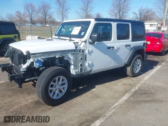 2023 Jeep Wrangler Sport S z VIN 1C4HJXDN4PW702277, wystawiony jako IAAI lot #41835864 z przebiegiem 27 768 mil mil oraz . Historia ofert i sprzedaży dostępna na DreamBid. Obrazek 17.