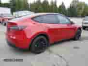 2021 Tesla Model Y Long Range with VIN 5YJYGAEE2MF215721, listed as a Copart auction lot 84570055 with 42,763 mi miles and Salvage title. Bid and sale history available at DreamBid. Image 3.