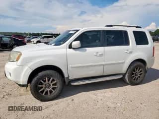 2011 Honda Pilot EX-L with VIN 5FNYF3H53BB031959, listed as a Copart auction lot 66347905 with 268,778 mi miles and Salvage title. Bid and sale history available at DreamBid. Image 1.