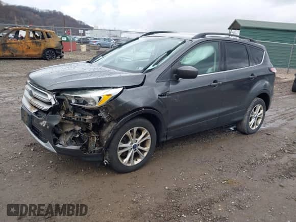 2018 Ford Escape SE with VIN 1FMCU9GD9JUB18987, listed as a IAAI auction lot 40912957 with 110,279 mi miles and . Bid and sale history available at DreamBid. Image 17.