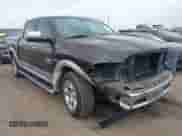 2013 Ram 1500 Laramie with VIN 1C6RR6NT5DS697668, listed as a IAAI auction lot 41501112 with 146,001 mi miles and . Bid and sale history available at DreamBid. Image 1.