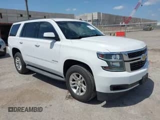 2015 Chevrolet Tahoe LS with VIN 1GNSCAKC6FR239156, listed as a IAAI auction lot 42545513 with 117,863 mi miles and . Bid and sale history available at DreamBid. Image 1.