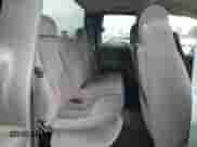 2004 GMC Sierra 1500 SLE z VIN 2GTEK19T541150960, wystawiony jako Copart lot #80576035 z przebiegiem 161 896 mil mil oraz Czysty tytuł • Clean title. Historia ofert i sprzedaży dostępna na DreamBid. Obrazek 10.