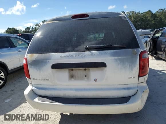 2003 Dodge Caravan SE with VIN 1D4GP24393B210280, listed as a Copart auction lot 70025055 with 148,586 mi miles and Salvage title. Bid and sale history available at DreamBid. Image 6.