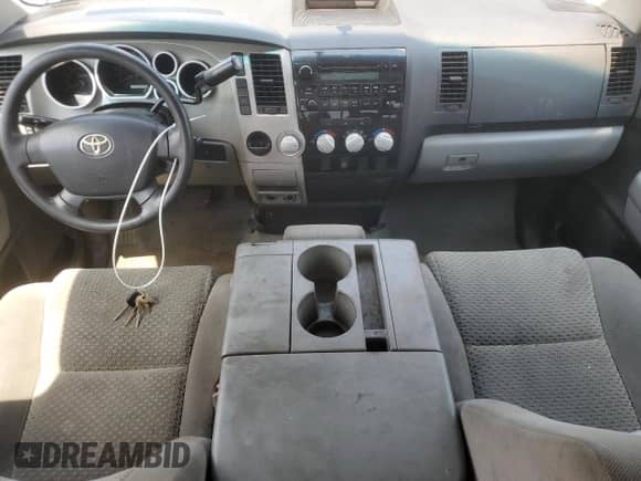 2007 Toyota Tundra SR5 z VIN 5TFST54107X001814, wystawiony jako Copart lot #62830525 z przebiegiem 188 609 mil mil oraz Szkoda całkowita • Salvage title. Historia ofert i sprzedaży dostępna na DreamBid. Obrazek 8.