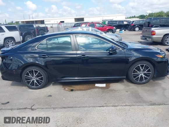 2023 Toyota Camry SE с VIN 4T1G11AK2PU771320, выставлен на аукционе IAAI как лот 42341023 с пробегом 42 568 миль миль и . История ставок и продаж доступна на DreamBid. Изображение 14.