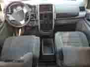 2010 Dodge Grand Caravan SXT with VIN 2D4RN5DX5AR125907, listed as a Copart auction lot 69637335 with 211,789 mi miles and Salvage title. Bid and sale history available at DreamBid. Image 8.