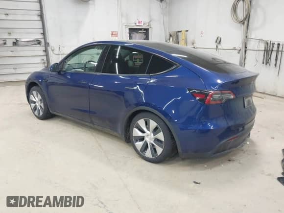 2021 Tesla Model Y Long Range with VIN 5YJYGDEE2MF159264, listed as a IAAI auction lot 43167588 with 83,012 mi miles and . Bid and sale history available at DreamBid. Image 3.