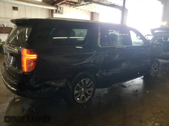 2024 Chevrolet Suburban LT with VIN 1GNSKCKD7RR107504, listed as a Copart auction lot 45410745 with 31,752 mi miles and Salvage title. Bid and sale history available at DreamBid. Image 3.