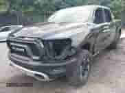 2019 Ram 1500 Rebel z VIN 1C6SRFLT1KN784936, wystawiony jako IAAI lot #42375986 z przebiegiem 78 539 mil mil oraz . Historia ofert i sprzedaży dostępna na DreamBid. Obrazek 6.