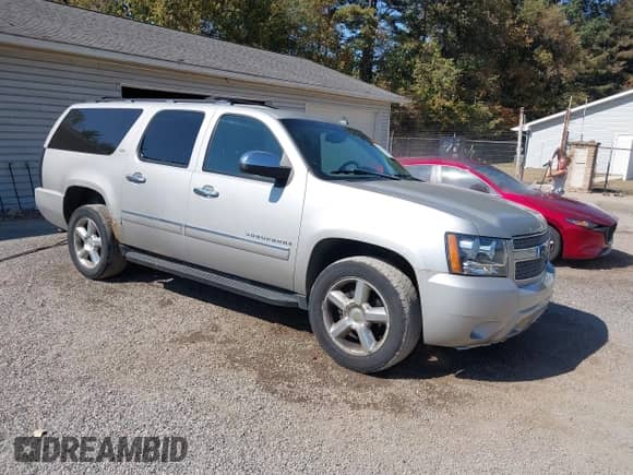 2009 Chevrolet Suburban LTZ z VIN 1GNFK363X9R189568, wystawiony jako IAAI lot #43251361 z przebiegiem 214 783 mil mil oraz . Historia ofert i sprzedaży dostępna na DreamBid. Obrazek 1.