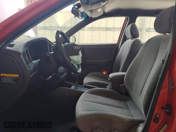 2005 Hyundai Elantra GLS z VIN KMHDN46D15U183148, wystawiony jako Copart lot #70007694 z przebiegiem 58 176 mil mil oraz Szkoda całkowita • Salvage title. Historia ofert i sprzedaży dostępna na DreamBid. Obrazek 7.