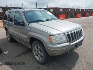 2002 Jeep Grand Cherokee Overland with VIN 1J8GW68J42C168795, listed as a IAAI auction lot 42349333 with 158,339 mi miles and . Bid and sale history available at DreamBid. Image 1.