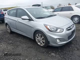 2012 Hyundai Accent SE with VIN KMHCU5AE7CU006010, listed as a IAAI auction lot 43610200 with 134,292 mi miles and . Bid and sale history available at DreamBid. Image 1.