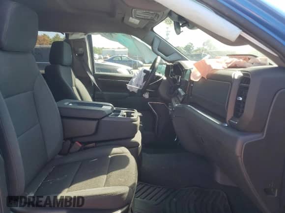 2025 Chevrolet Silverado 1500 with VIN 3GCPKKEKXSG321475, listed as a Copart auction lot 71133495 with 2,167 mi miles and Salvage title. Bid and sale history available at DreamBid. Image 7.
