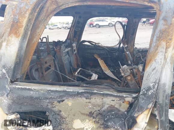 2006 Cadillac Escalade z VIN 1GYEC63N36R140923, wystawiony jako IAAI lot #42348753 z przebiegiem Nie podano mil oraz . Historia ofert i sprzedaży dostępna na DreamBid. Obrazek 8.