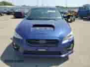 2016 Subaru WRX with VIN JF1VA1B61G9803812, listed as a Copart auction lot 68613805 with 63,864 mi miles and Salvage title. Bid and sale history available at DreamBid. Image 5.