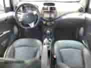 2016 Chevrolet Spark LT z VIN KL8CL6S01GC649571, wystawiony jako Copart lot #64287375 z przebiegiem 95 050 mil mil oraz Szkoda całkowita • Salvage title. Historia ofert i sprzedaży dostępna na DreamBid. Obrazek 8.