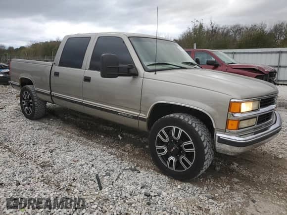 2000 CHEVROLET GMT C2500 with VIN 1GCGC23R7YF405017, listed as a Copart auction lot 80281364 with 168,919 mi miles and Clean title. Bid and sale history available at DreamBid. Image 4.