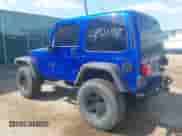 2000 Jeep Wrangler Sport with VIN 1J4FA49S0YP735660, listed as a IAAI auction lot 43192698 with Not provided miles and . Bid and sale history available at DreamBid. Image 3.