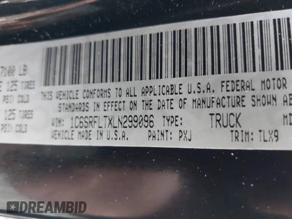 2020 Ram 1500 Rebel z VIN 1C6SRFLTXLN299096, wystawiony jako IAAI lot #42149383 z przebiegiem 60 050 mil mil oraz . Historia ofert i sprzedaży dostępna na DreamBid. Obrazek 9.