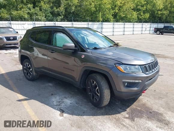 2021 Jeep Compass Trailhawk z VIN 3C4NJDDB5MT556478, wystawiony jako IAAI lot #43212199 z przebiegiem 81 134 mil mil oraz . Historia ofert i sprzedaży dostępna na DreamBid. Obrazek 1.