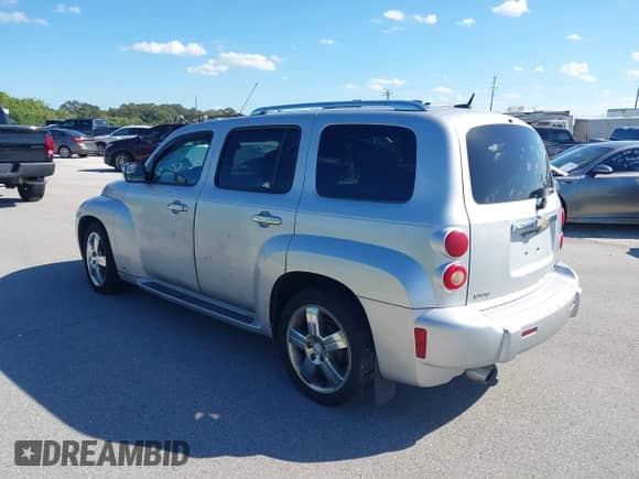 2009 Chevrolet HHR 2LT z VIN 3GNCA53V89S555371, wystawiony jako IAAI lot #43471819 z przebiegiem 294 744 mil mil oraz . Historia ofert i sprzedaży dostępna na DreamBid. Obrazek 3.