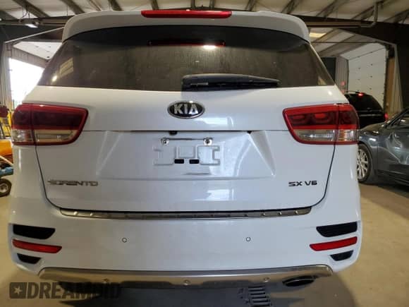2018 Kia Sorento SX z VIN 5XYPKDA59JG428865, wystawiony jako Copart lot #81065545 z przebiegiem 85 434 mil mil oraz Szkoda całkowita • Salvage title. Historia ofert i sprzedaży dostępna na DreamBid. Obrazek 6.