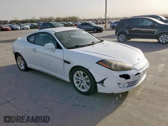 2007 Hyundai Tiburon GS с VIN KMHHM66D27U260421, выставлен на аукционе Copart как лот 48982505 с пробегом 100 045 миль миль и Чистый • Clean title. История ставок и продаж доступна на DreamBid. Изображение 4.