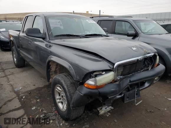 2003 Dodge Dakota Sport с VIN 1D7HG38N33S106425, выставлен на аукционе Copart как лот 89371695 с пробегом 159 449 миль миль и Списание • Salvage title. История ставок и продаж доступна на DreamBid. Изображение 4.