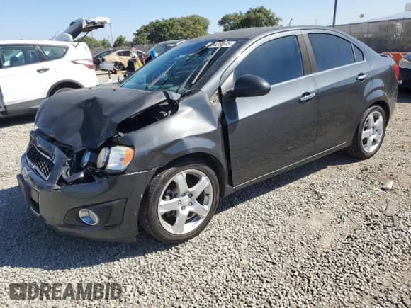 2016 Chevrolet Sonic LTZ with VIN 1G1JE5SB0G4146802, listed as a Copart auction lot 80408445 with 121,743 mi miles and Salvage title. Bid and sale history available at DreamBid. Image 1.