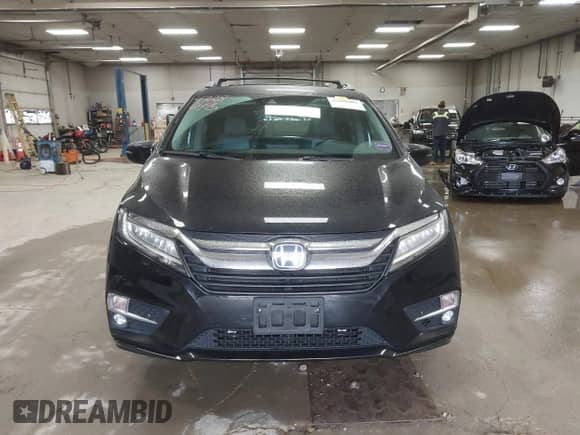 2019 Honda Odyssey Elite z VIN 5FNRL6H90KB013601, wystawiony jako IAAI lot #43286495 z przebiegiem 103 179 mil mil oraz . Historia ofert i sprzedaży dostępna na DreamBid. Obrazek 13.