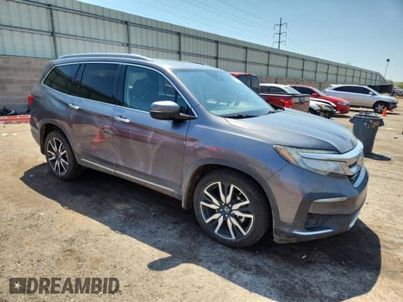 2020 Honda Pilot Elite z VIN 5FNYF6H02LB032625, wystawiony jako Copart lot #69782685 z przebiegiem 68 084 mil mil oraz Czysty tytuł • Clean title. Historia ofert i sprzedaży dostępna na DreamBid. Obrazek 4.