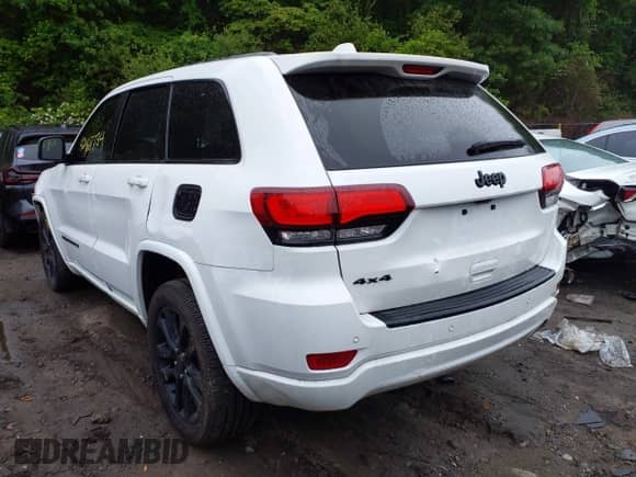 2020 Jeep Grand Cherokee Laredo E with VIN 1C4RJFAG9LC271385, listed as a IAAI auction lot 42468734 with 68,529 mi miles and . Bid and sale history available at DreamBid. Image 3.