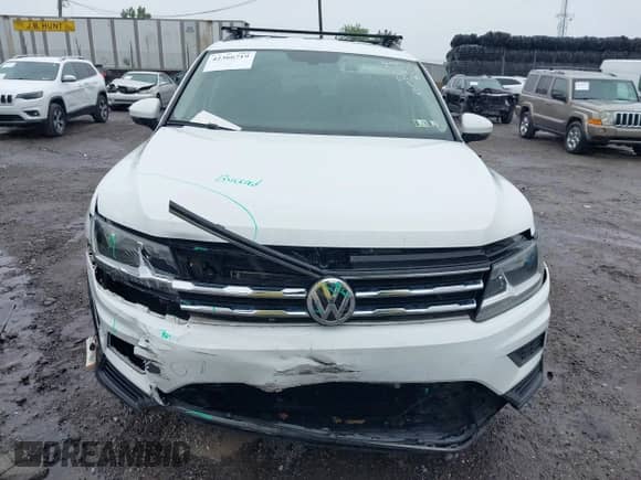 2020 Volkswagen Tiguan SE с VIN 3VV2B7AX9LM163952, выставлен на аукционе IAAI как лот 42366719 с пробегом 69 866 миль миль и . История ставок и продаж доступна на DreamBid. Изображение 12.