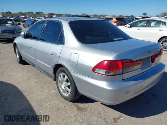 2002 Honda Accord SE with VIN 1HGCG56722A169896, listed as a IAAI auction lot 41234474 with 171,829 mi miles and . Bid and sale history available at DreamBid. Image 3.