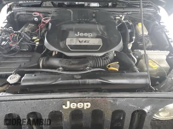 2016 Jeep Wrangler Sport with VIN 1C4AJWAG5GL132647, listed as a Copart auction lot 71629025 with 94,550 mi miles and Salvage title. Bid and sale history available at DreamBid. Image 11.