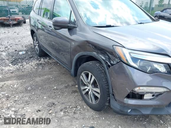 2017 Honda Pilot EX-L with VIN 5FNYF6H79HB028575, listed as a IAAI auction lot 42726028 with 76,494 mi miles and . Bid and sale history available at DreamBid. Image 19.