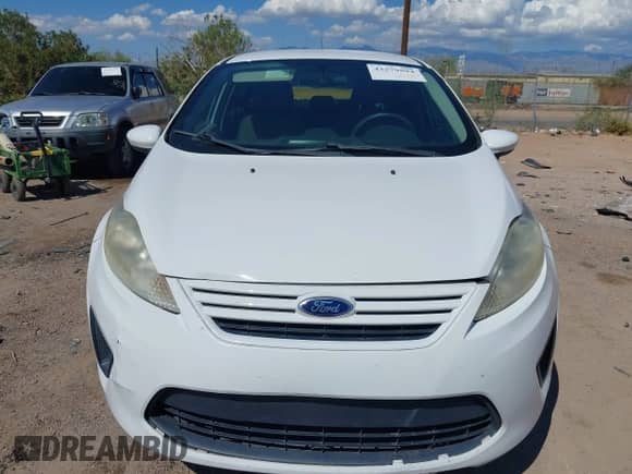 2013 Ford Fiesta S with VIN 3FADP4AJ3DM144405, listed as a IAAI auction lot 43279594 with 93,264 mi miles and . Bid and sale history available at DreamBid. Image 12.