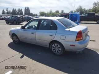 2005 Hyundai Accent GLS с VIN KMHCG45C55U623340, выставлен на аукционе Copart как лот 59587304 с пробегом 275 364 миль миль и Списание • Salvage title. История ставок и продаж доступна на DreamBid. Изображение 2.