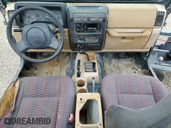 1998 Jeep Wrangler SE z VIN 1J4FY29P1WP763752, wystawiony jako Copart lot #70510885 z przebiegiem 228 480 mil mil oraz Szkoda całkowita • Salvage title. Historia ofert i sprzedaży dostępna na DreamBid. Obrazek 8.