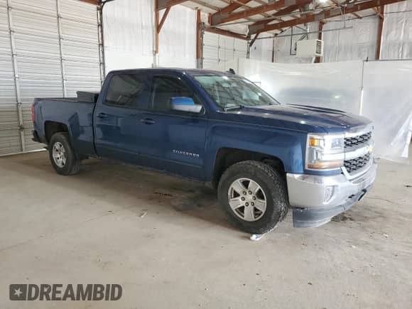 2016 Chevrolet Silverado 1500 LT with VIN 1GCUKREC9GF164552, listed as a Copart auction lot 52196485 with 105,668 mi miles and Salvage title. Bid and sale history available at DreamBid. Image 4.