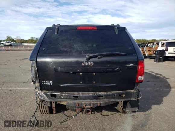 2010 Jeep Grand Cherokee Laredo с VIN 1J4PR4GKXAC139324, выставлен на аукционе Copart как лот 82410215 с пробегом 251 394 миль миль и Списание • Salvage title. История ставок и продаж доступна на DreamBid. Изображение 6.