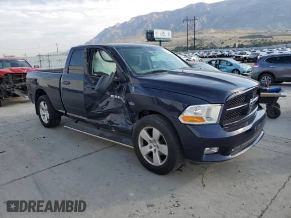 2012 Ram 1500 Express с VIN 1C6RD7FT8CS311777, выставлен на аукционе Copart как лот 70416035 с пробегом 130 119 миль миль и Списание • Salvage title. История ставок и продаж доступна на DreamBid. Изображение 4.