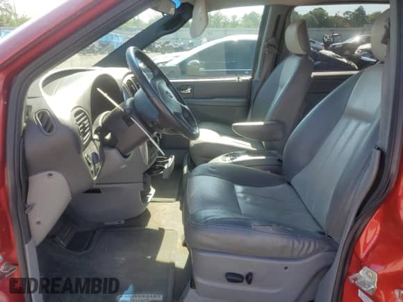 2004 Dodge Caravan SXT with VIN 2D4GP44L64R538237, listed as a Copart auction lot 60810815 with 122,766 mi miles and Salvage title. Bid and sale history available at DreamBid. Image 7.