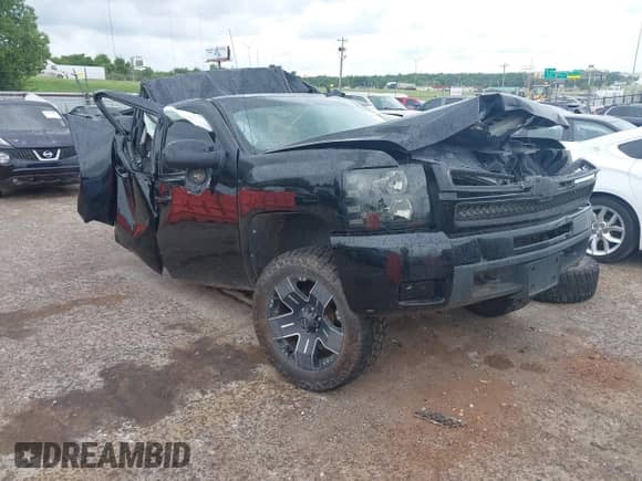 2012 Chevrolet Silverado 1500 LTZ z VIN 3GCPKTE75CG108923, wystawiony jako IAAI lot #42626410 z przebiegiem Nie podano mil oraz . Historia ofert i sprzedaży dostępna na DreamBid. Obrazek 1.
