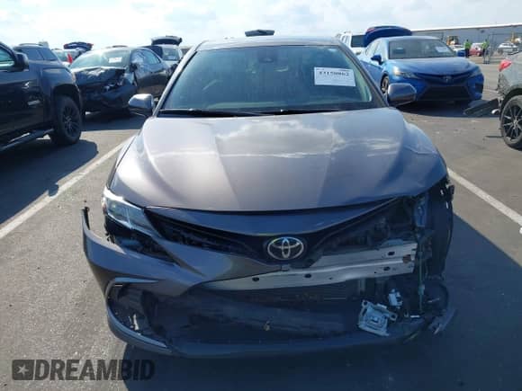 2021 Toyota Camry LE z VIN 4T1C11AK7MU593799, wystawiony jako IAAI lot #43150862 z przebiegiem 86 619 mil mil oraz . Historia ofert i sprzedaży dostępna na DreamBid. Obrazek 13.
