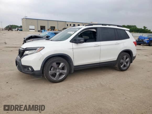 2020 Honda Passport Touring with VIN 5FNYF7H97LB000127, listed as a Copart auction lot 57613775 with 68,851 mi miles and Salvage title. Bid and sale history available at DreamBid. Image 1.