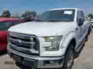 2015 Ford F-150 XLT z VIN 1FTFX1EGXFKE06009, wystawiony jako IAAI lot #42863829 z przebiegiem 157 228 mil mil oraz . Historia ofert i sprzedaży dostępna na DreamBid. Obrazek 2.